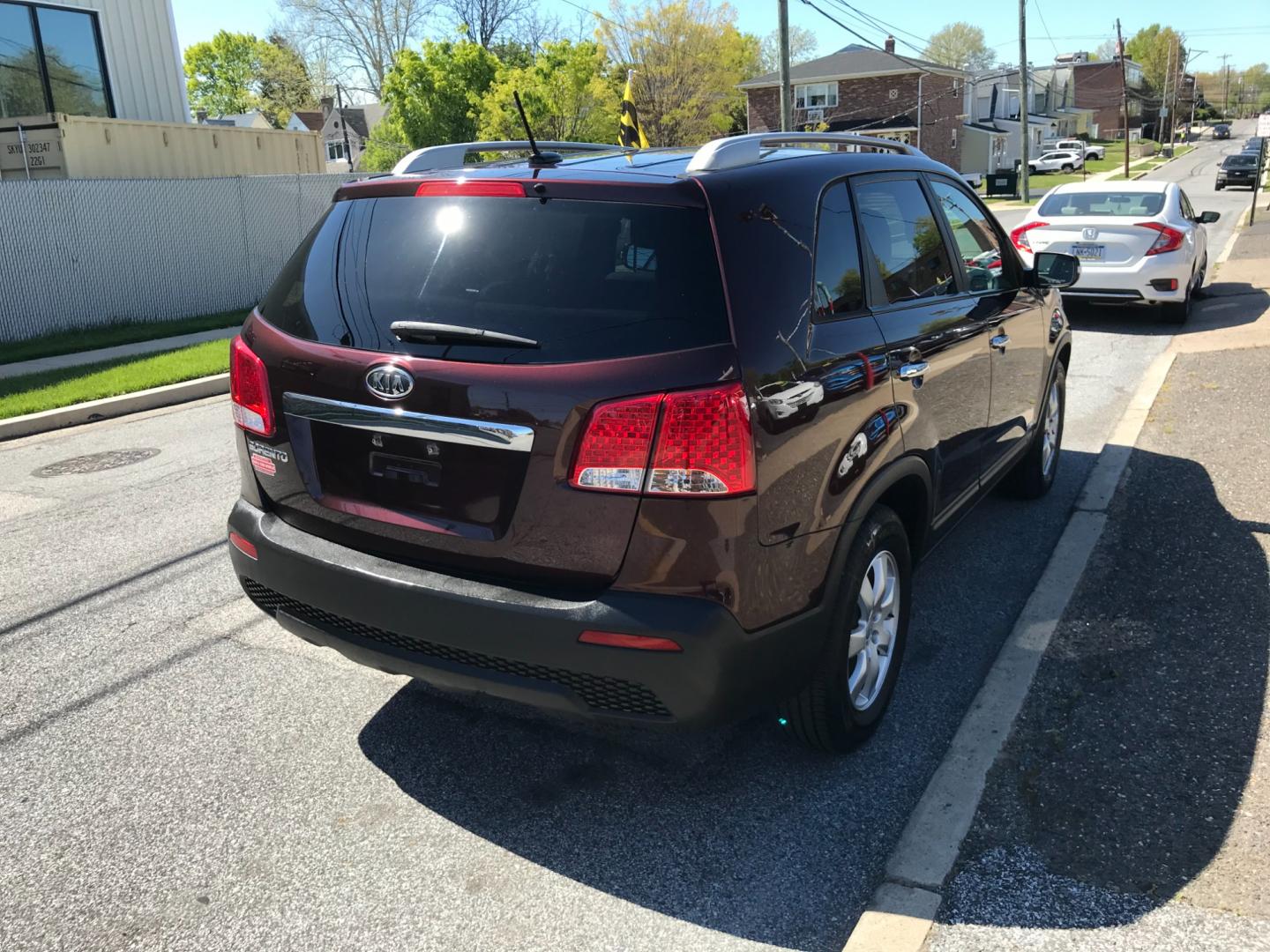 2012 Burgundy /Gray Kia Sorento LX (5XYKTDA29CG) with an 3.5 V6 engine, Automatic transmission, located at 577 Chester Pike, Prospect Park, PA, 19076, (610) 237-1015, 39.886154, -75.302338 - Photo#4